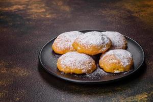 Homemade corn cookies on concrete table - healthy homemade vegan vegetarian pastry photo