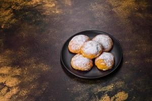 Homemade corn cookies on concrete table - healthy homemade vegan vegetarian pastry photo