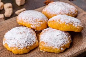 Homemade corn cookies on concrete table - healthy homemade vegan vegetarian pastry photo