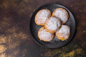 Homemade corn cookies on concrete table - healthy homemade vegan vegetarian pastry photo