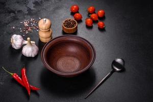 An empty plate with a knife, fork or spoon with a wooden cutting board photo