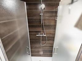 New shower cabin after renovation. Purity and freshness. photo