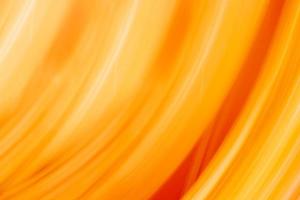 Bright orange abstract background. Curved lines and semicircles with gradient. Backdrop photo