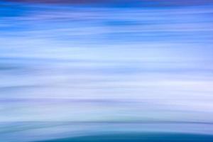 Abstract background in blue tones with horizontal waves, Business, travel, technology theme. Backdrop photo