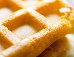 Viennese waffles close-up. Large cage and baking texture - culinary background.