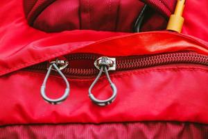 Travel bag. Zip lock on the backpack red. photo