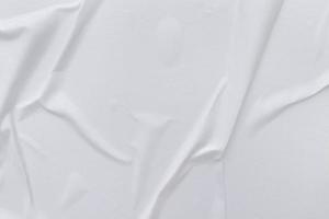 Blank white paper is crumpled texture background. Crumpled paper texture backgrounds for various purposes photo