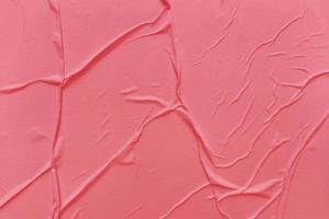 Blank red paper is crumpled texture background. Crumpled paper texture backgrounds for various purposes photo