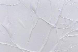 Blank white paper is crumpled texture background. Crumpled paper texture backgrounds for various purposes photo