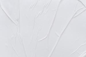 Blank white paper is crumpled texture background. Crumpled paper texture backgrounds for various purposes photo