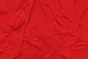 Blank red paper is crumpled texture background. Crumpled paper texture backgrounds for various purposes photo
