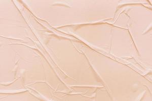 Blank cream paper is crumpled texture background. Crumpled paper texture backgrounds for various purposes photo