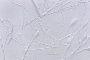 Blank white paper is crumpled texture background. Crumpled paper texture backgrounds for various purposes photo
