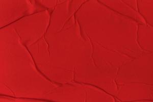 Blank red paper is crumpled texture background. Crumpled paper texture backgrounds for various purposes photo