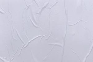 Blank white paper is crumpled texture background. Crumpled paper texture backgrounds for various purposes photo