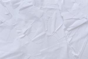 Blank white paper is crumpled texture background. Crumpled paper texture backgrounds for various purposes photo