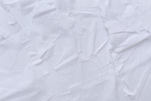 Blank white paper is crumpled texture background. Crumpled paper texture backgrounds for various purposes photo
