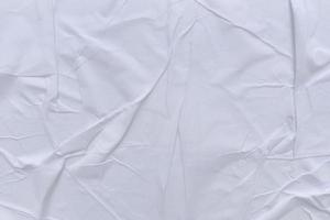 Blank white paper is crumpled texture background. Crumpled paper texture backgrounds for various purposes photo