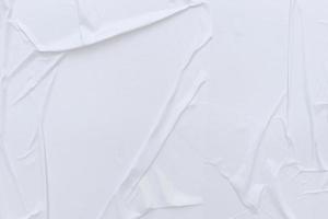 Blank white paper is crumpled texture background. Crumpled paper texture backgrounds for various purposes photo