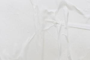 Blank white paper is crumpled texture background. Crumpled paper texture backgrounds for various purposes photo