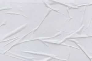 Blank white paper is crumpled texture background. Crumpled paper texture backgrounds for various purposes photo
