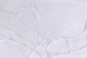 Blank white paper is crumpled texture background. Crumpled paper texture backgrounds for various purposes photo