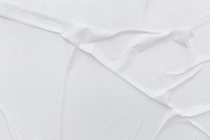 Blank white paper is crumpled texture background. Crumpled paper texture backgrounds for various purposes photo