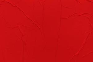 Blank red paper is crumpled texture background. Crumpled paper texture backgrounds for various purposes photo