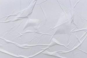 Blank white paper is crumpled texture background. Crumpled paper texture backgrounds for various purposes photo
