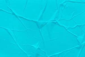 Blank blue paper is crumpled texture background. Crumpled paper texture backgrounds for various purposes photo