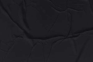 Blank black paper is crumpled texture background. Crumpled paper texture backgrounds for various purposes photo