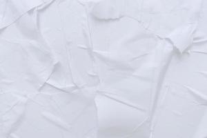 Blank white paper is crumpled texture background. Crumpled paper texture backgrounds for various purposes photo