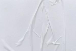 Blank white paper is crumpled texture background. Crumpled paper texture backgrounds for various purposes photo