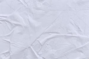 Blank white paper is crumpled texture background. Crumpled paper texture backgrounds for various purposes photo