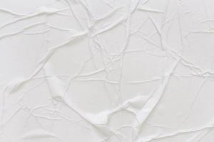 Blank white paper is crumpled texture background. Crumpled paper texture backgrounds for various purposes photo