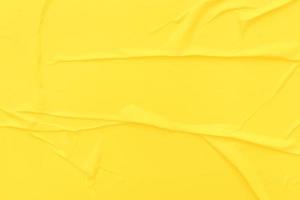 Blank yellow paper is crumpled texture background. Crumpled paper texture backgrounds for various purposes photo