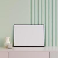 Modern and minimalist horizontal black poster or photo frame mockup on the table in the living room. 3d rendering.