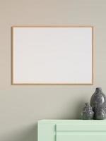 Modern and minimalist horizontal wooden poster or photo frame mockup on the wall in the living room. 3d rendering.