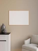 Simple and minimalist horizontal wooden poster or photo frame mockup on the wall in the living room. 3d rendering.