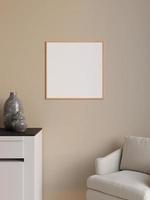 Simple and minimalist square wooden poster or photo frame mockup on the wall in the living room. 3d rendering.
