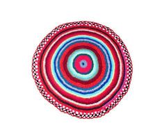 Round knitted carpet photo