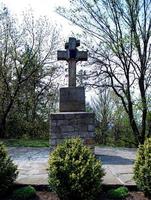 stone cross on a stone foundation photo