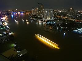 Night Shot Long Exposure Cruises in Chaophraya River Bangkok photo