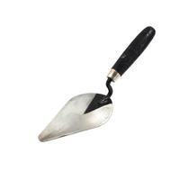 Old trowel on isolated white background photo