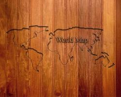 World map on a brown blackboard with the inscription photo