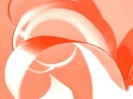 vibrant colourful red paper spiral ribbon high quality image or photograph photo