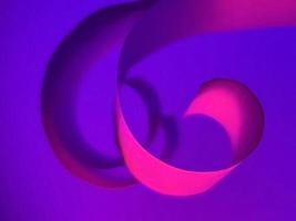 vibrant colourful violet paper spiral ribbon high quality image or photograph photo