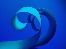 vibrant colourful cool blue paper spiral ribbon high quality image or photograph photo
