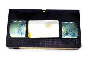 vintage Old analog tape VHS cassette on white backgorund. Retro nostalgia. photo