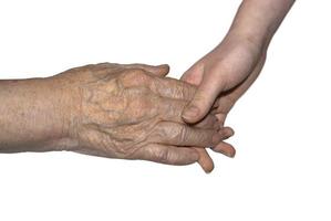 hand of her grandmother and granddaughter photo